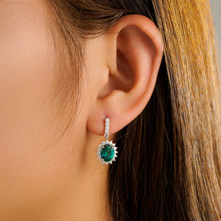 Oval Emerald & Moissanite Drop Earrings With Pavé Halo
