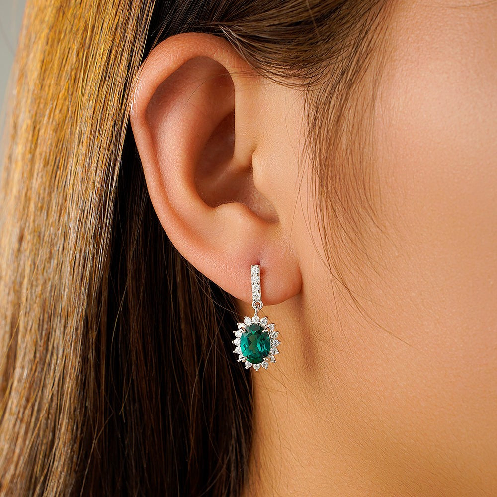 Oval Emerald & Moissanite Drop Earrings With Pavé Halo