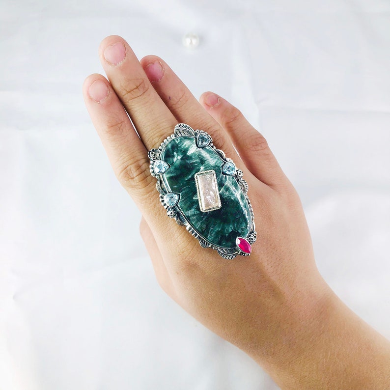 Natural Seraphinite, Ruby, Rose Quartz And Blue Topaz Ring By Harshita Jewellery