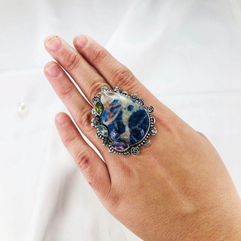 Natural Sodalite, Blue Topaz, Peridot And Faceted Amethyst Ring By Harshita Jewellery