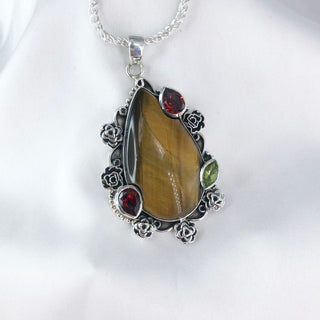 Natural Tiger's Eye, Garnet & Peridot Gemstone Pendant By Harshita Jewellery